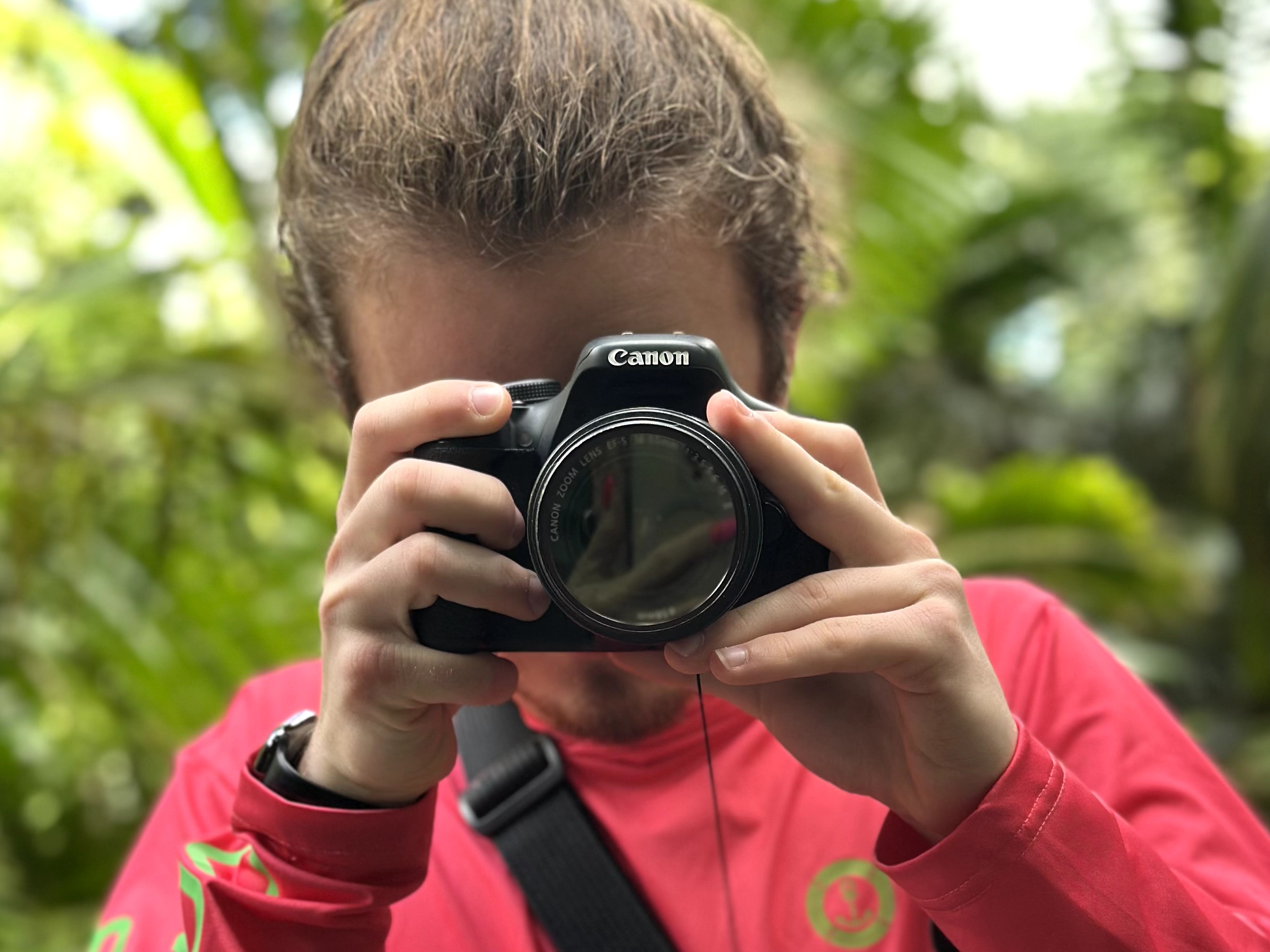 Sergio taking a photo with camera