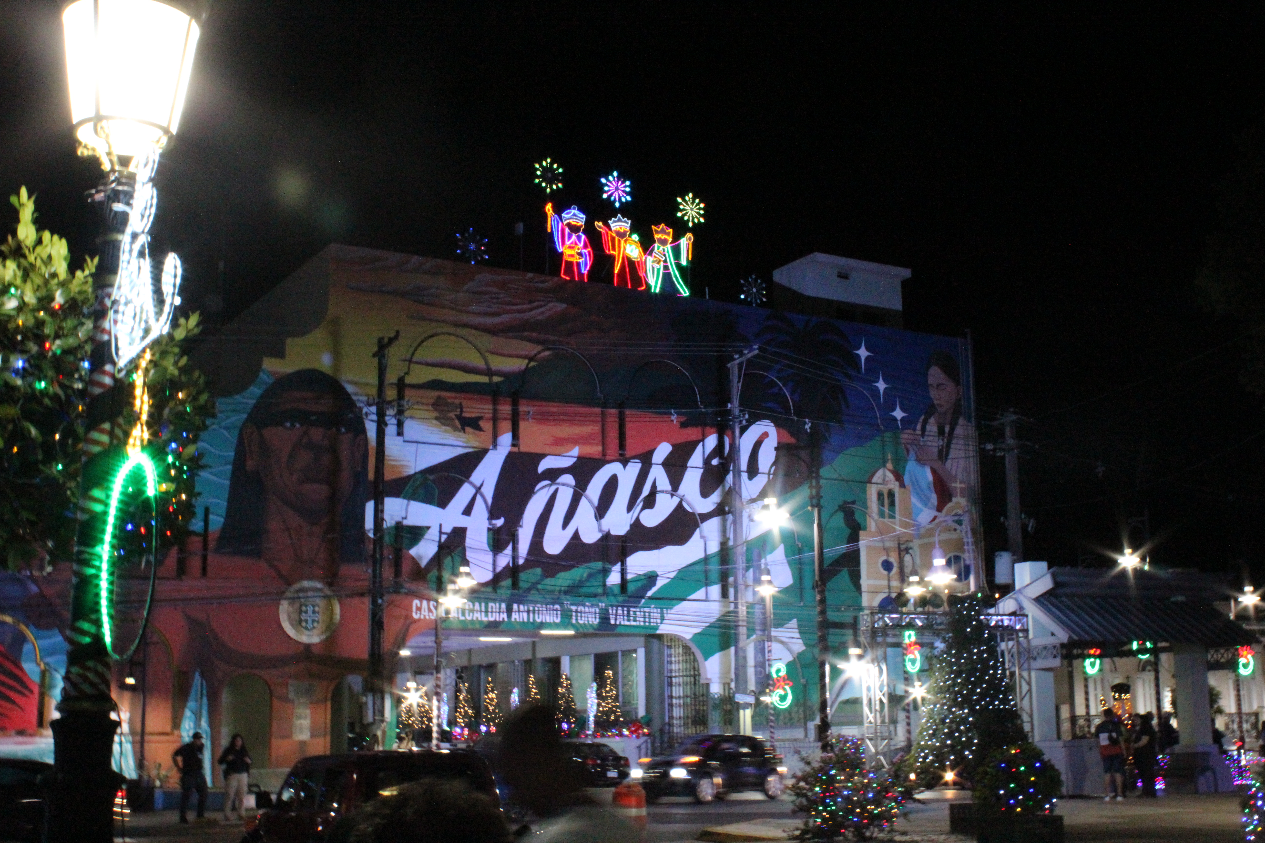 Busy Anasco town center with Three Kings lights